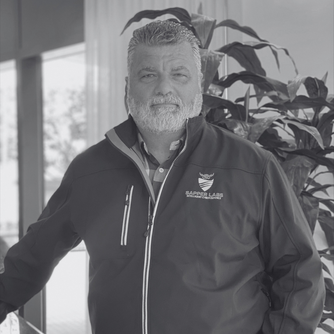 black and white headshot of AL DILLON, Chief Executive Officer at Sapper Labs Group Inc.